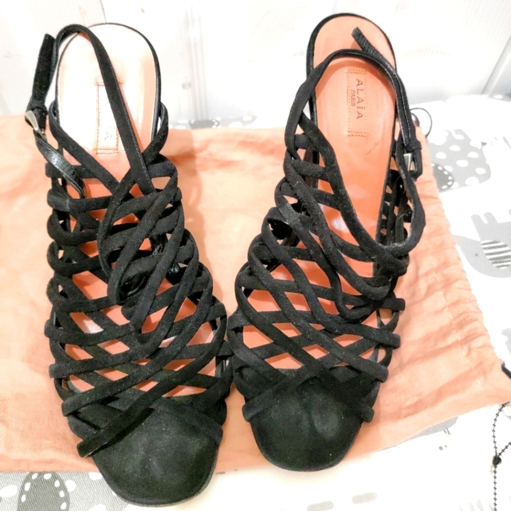 Alaia strappy sandals.